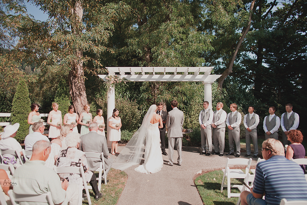 Ceremony on elegant summer wedding at Laurel Creek Manor. Sunny day in Seattle, PNW with lot of green classic details