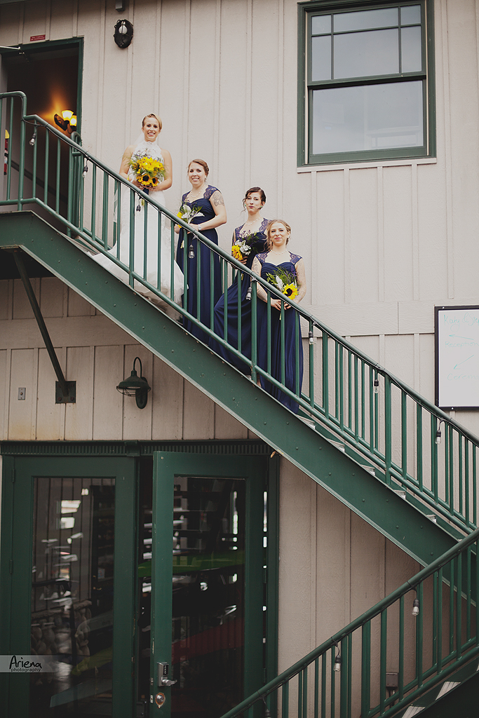 Union Lake summer wedding in boat house. Blue and yellow wedding colors. Badgley Mischka designer wedding shoes