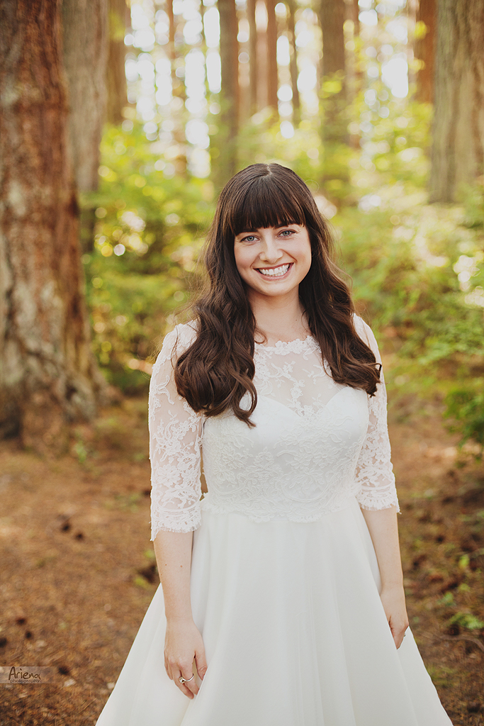 Rustic forest wedding Kitsap Memorial State Park. Sunny summer weather. Bride wearing western boots