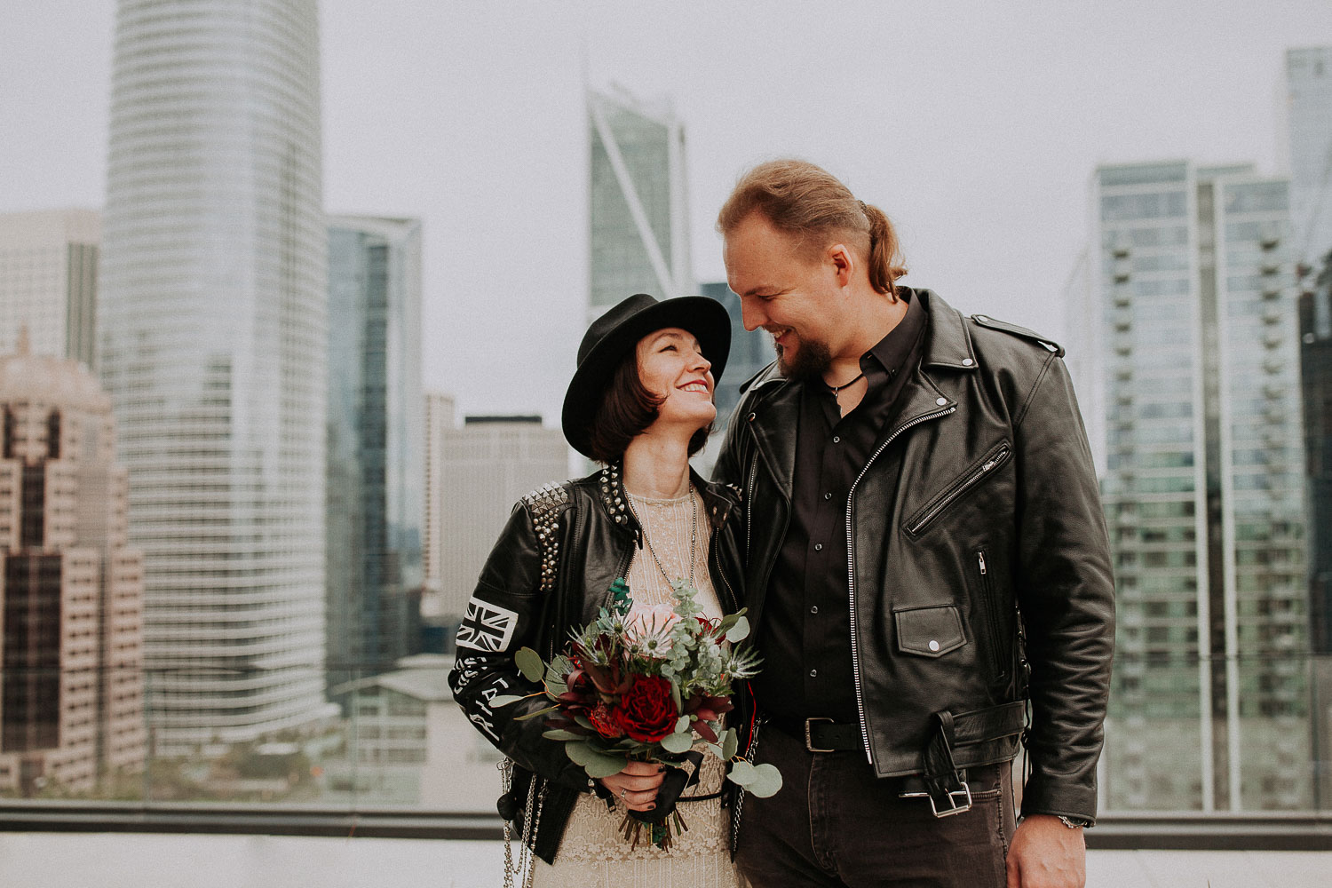 Rock'n'Roll elopement in San Francisco Downtown. Hard Rock bikers wedding. Leather jackets and biker boots