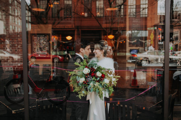 Winter christian and Jewish wedding in Sole Repair Shop in Seattle. Christmas decoration. Capitol Hill intimate wedding