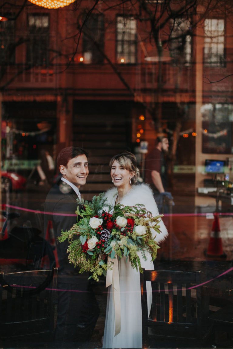 Winter christian and Jewish wedding in Sole Repair Shop in Seattle. Christmas decoration. Capitol Hill intimate wedding